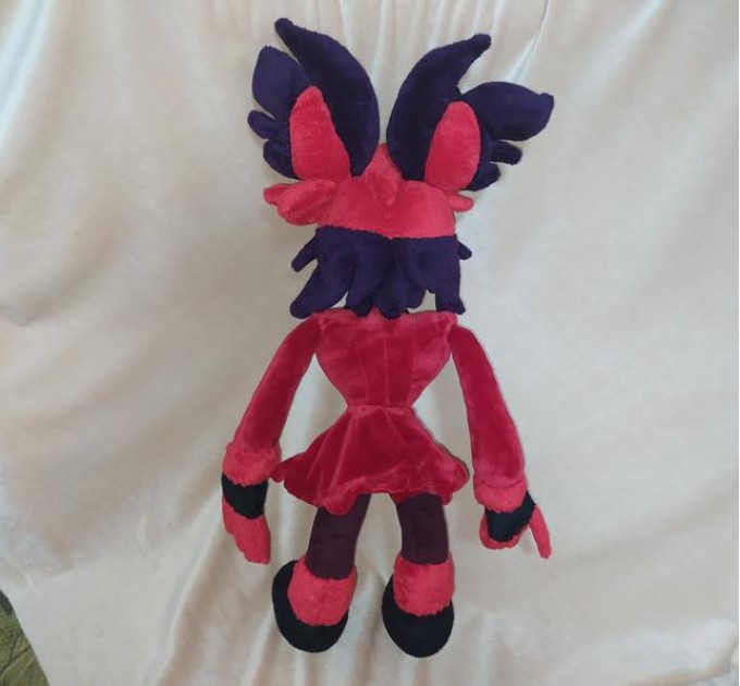 This is a sample of the Alastor from hazbin hotel plush toy.