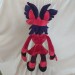 This is a sample of the Alastor from hazbin hotel plush toy.