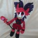 This is a sample of the Alastor from hazbin hotel plush toy.